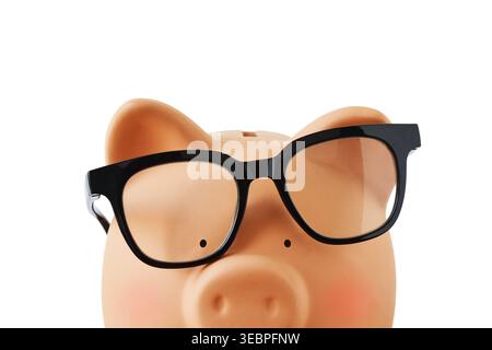 Close-up of piggy bamk with falling eyeglasses - Concept of economy, stress and bad money management Stock Photo