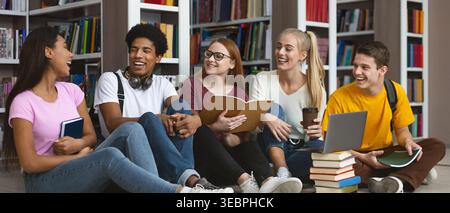 Group of Students Studying Together in a Vibrant Library Setting During the Afternoon Stock Photo