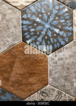Geometric patterned tiles with hexagon shapes in various textures suitable as a background. Mobile photo Stock Photo