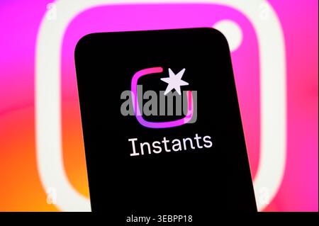 Paris, France - April 27, 2026: The Instagram Instants logo and text are shown on a mobile phone with the classic Instagram icon in the background. Stock Photo