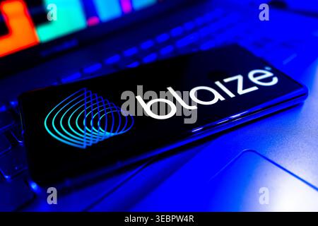 Blaize Artificial Intelligence Semiconductor Technology Company Logo Displayed On Screen With Financial Performance Chart Background Stock Photo