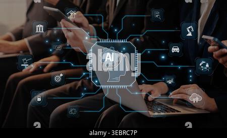 A modern office scene featuring business professionals engaged with laptops and smartphones, surrounded by icons representing artificial intelligence Stock Photo