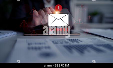 Digital warning mail interface highlights email threat detection, security monitoring, and proactive prevention of phishing and malware intrusions Stock Photo