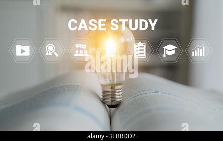 A creative imagery featuring a glowing light bulb on an open book, symbolizing knowledge, learning, and insight in the context of case study research Stock Photo