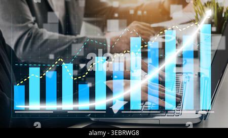 Dynamic business analytics image showcasing data visualization with rising graphs and digital charts, representing team collaboration in a modern Stock Photo