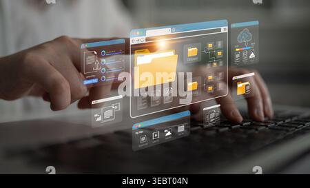 Hands Typing on Laptop with Digital File Management Interface and Virtual Folder Visualization in Modern Workspace Environment Sigmoid Stock Photo