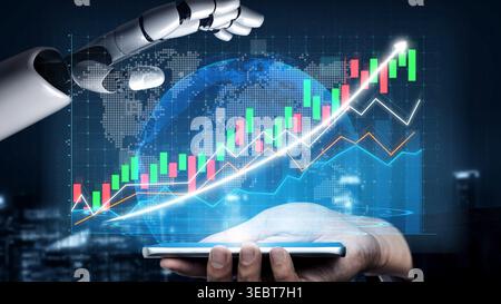 A robot hand interacts with a smartphone displaying dynamic financial graphs and growth trends, symbolizing the fusion of technology and investment Stock Photo