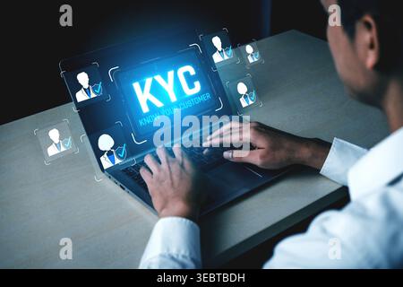 Man Engaging with Laptop Displaying KYC Concept for Customer Identification and Verification in Digital Business Environment Sigmoid Stock Photo