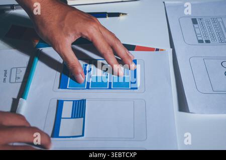 UXUI design brainstorming session with sketches and digital tools Stock Photo