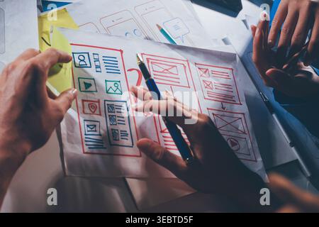 UXUI design brainstorming session with sketches and digital tools Stock Photo