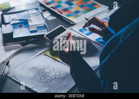 UXUI design brainstorming session with sketches and digital tools Stock Photo