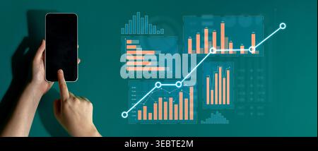 A business professional interacts with a smartphone displaying data trends, accompanied by various colorful charts and graphs emphasizing analytics Stock Photo