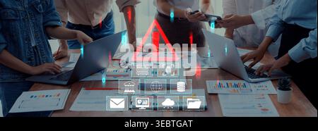 Team Collaboration on Digital Data Management with Warning Sign and Business Charts in Modern Office Setting Quark. Stock Photo