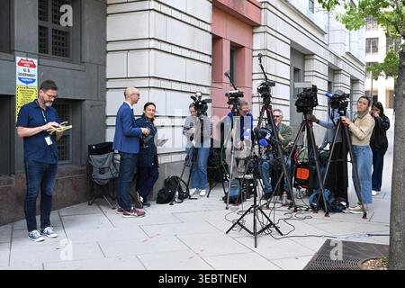 Washington, USA. 27th Apr, 2026. Media crews are positioned near the entrance to the U.S. District Court for the District of Columbia in Washington, DC, the United States, April 27, 2026. Cole Tomas Allen, the suspect in the shooting Saturday night at the White House Correspondents' Association Dinner, was charged on Monday with attempting to assassinate U.S. President Donald Trump. Credit: Li Rui/Xinhua/Alamy Live News Stock Photo
