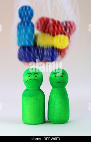 People concerned about the group trapped in a mesh bag Stock Photo