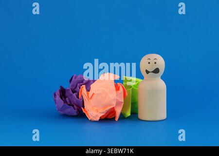 A person frustrated by discarding several ideas Stock Photo