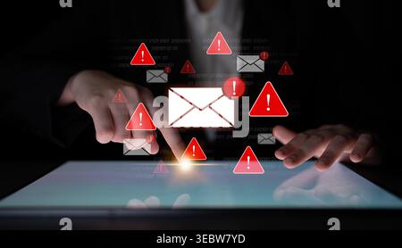 Concept of a cybersecurity warning for unsafe email communication. This alert signifies a phishing attack, spam, or malware risk that requires Stock Photo