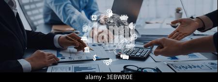 A professional meeting showcasing teamwork and collaboration, featuring finance data discussion and digital technology for innovative business Stock Photo