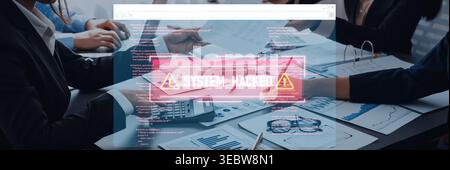 Computer security breach alert with system hacked message displayed over business meeting background with data charts and graphs on table Trope. Stock Photo
