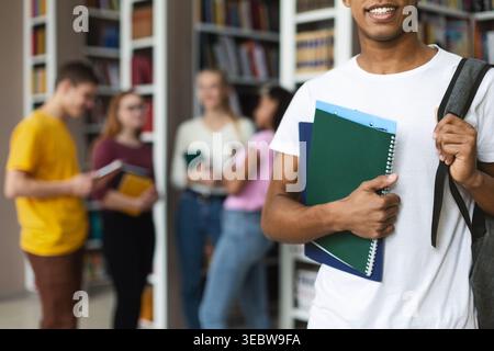 Group of Students Engaged in Study and Discussion at a Library During the Afternoon Stock Photo