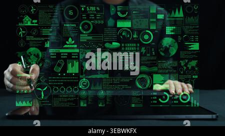 Explore a futuristic green energy technology interface showcasing data analytics, charts, and visualizations that highlight renewable energy trends Stock Photo