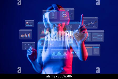 A user engaged in a futuristic virtual reality environment interacts with vibrant displays of artificial intelligence and data analytics metrics Stock Photo