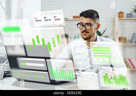 Business professional analyzes digital data with artificial intelligence tools in a modern office Stock Photo
