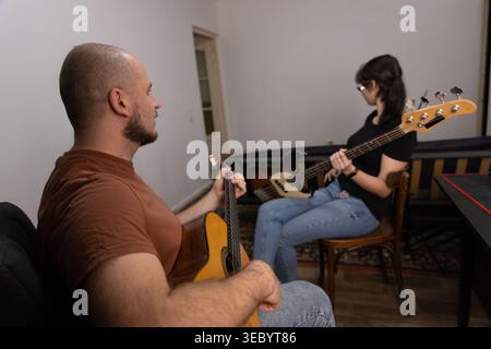 Musicians back view during creative process Stock Photo