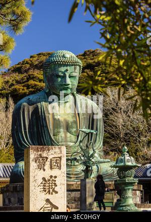 The Great Buddha of Kamakura (Daibutsu) with stone lantern in