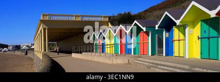 Colourful, painted wooden beach huts at Barry Island seaside resort, South Wales, UK Stock Photo