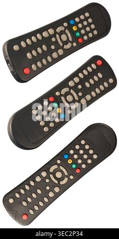 set of black plastic remote controls with multi colored buttons isolated white background, mock-up template in different angles Stock Photo