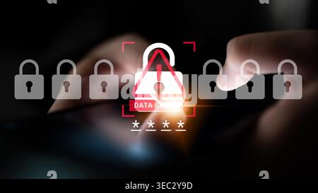 Close-up of a smartphone displaying a data breach alert with security locks, highlighting the importance of cybersecurity and data protection in the Stock Photo