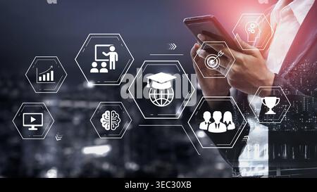Modern Businessman Engaging with Smartphone Surrounded by Digital Education and Business Icons in a Night City Background Gluon. Stock Photo