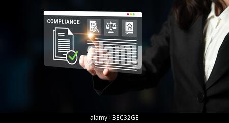 A business professional engages with an interactive digital interface focusing on compliance elements, highlighting essential documents and legal Stock Photo