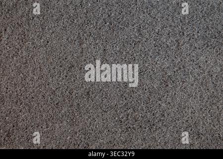 Synthetic abrasive fiber mesh texture surface for industrial filtration background Stock Photo