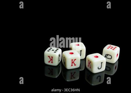dice with dices on dark background, close up Stock Photo