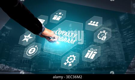 A professional hand interacts with a digital interface showcasing a loyalty program, featuring business icons with a modern city skyline in the Stock Photo
