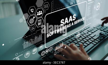 Modern Technology Interface Displaying SAAS Concept with Keyboard and Futuristic Graphical Elements. Asymptotic smart data analytic. Stock Photo