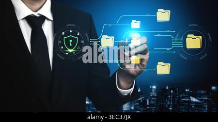 Businessman in Suit Using Digital Technology to Illustrate Data Protection and Security Concepts with Folder Icons and Cyber Elements in Background Stock Photo