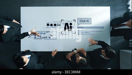 A diverse business team engages in a dynamic meeting, utilizing a modern digital interface showcasing data analytics and AI elements for effective Stock Photo