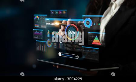 Modern Businesswoman Presenting Interactive Data Analysis and Visualization on Digital Screen with Charts and Graphs for Effective Insights Sigmoid Stock Photo