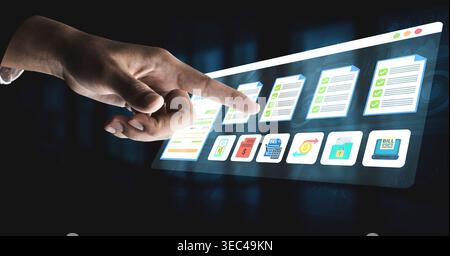 A hand interacts with a digital interface displaying organized checklists and colorful icons, symbolizing modern task management and efficient Stock Photo
