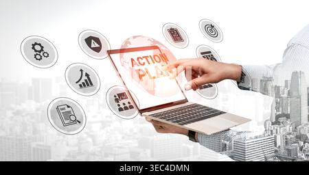 A professional hand interacts with a laptop displaying an action plan on a digital interface, surrounded by various marketing icons, symbolizing Stock Photo