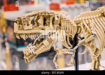19 October 2025, Belgrade, Serbia: LEGO bricks forming a T Rex dinosaur skeleton model, recreating a prehistoric fossil exhibit for education and play Stock Photo