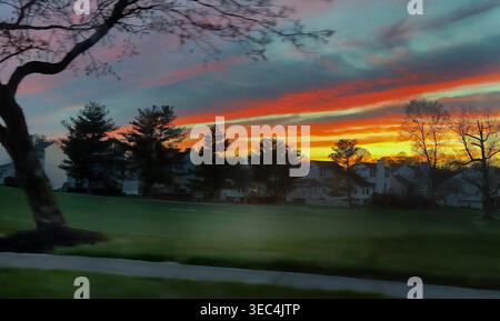An early spring sunset in an urban area Stock Photo