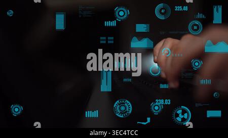 This image captures a futuristic digital interface filled with data visuals and graphs, showcasing technology and analysis in a modern environment Stock Photo