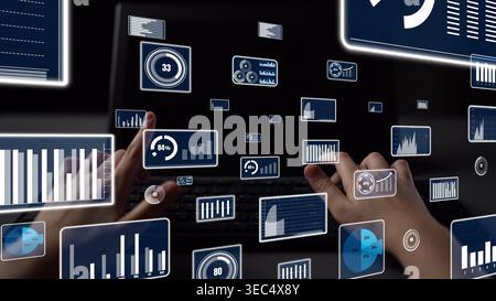 Engaging visual of hands interacting with a laptop displaying various digital graphs and charts, symbolizing modern data analysis and insightful Stock Photo