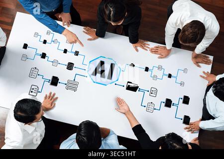 Diverse Team Collaborating on Innovative AI Concept on Large Whiteboard with Diagrams and Flowcharts in Modern Office Setting Quark. Stock Photo