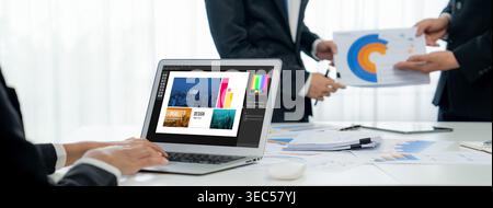 Graphic designer software for modern design of web page and commercial brisk ads showing on the computer screen Stock Photo