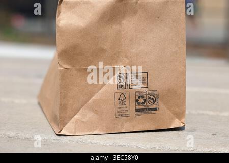 Recycling information and infographics on a brown paper bag Stock Photo